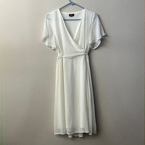 Ivory Swiss dot midi length dress. Size small